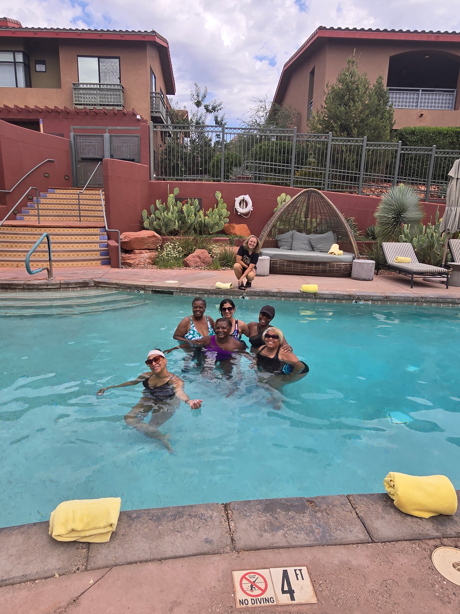 Friends enjoying the pool during the Sedona retreat